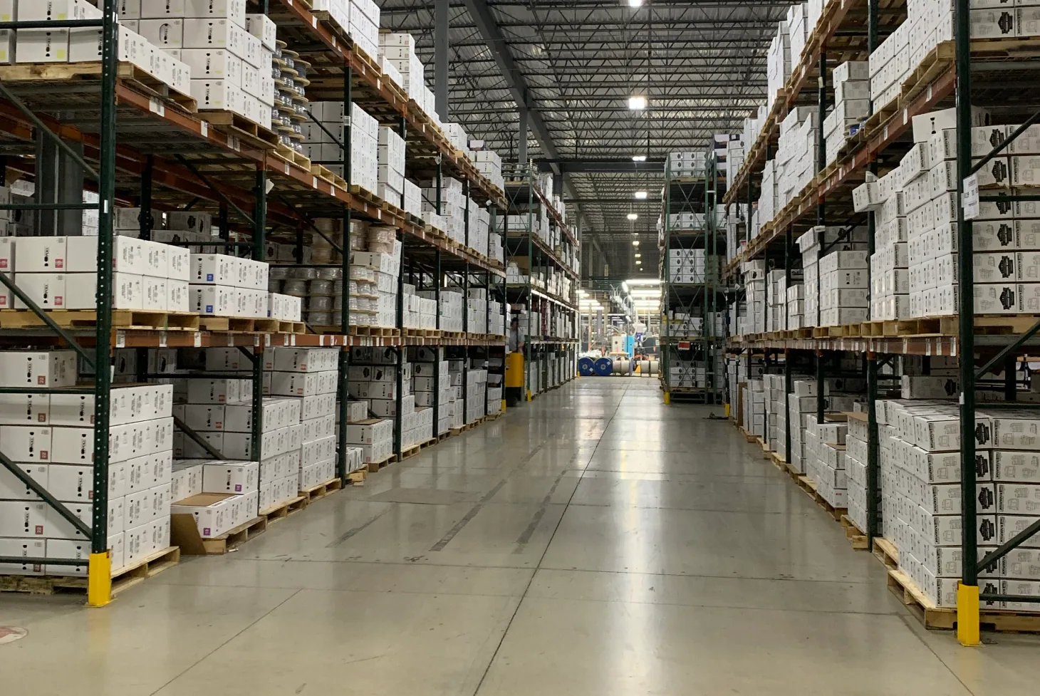 Warehouse racks filled with SmartWire boxes at a Windy City Wire stocking location.