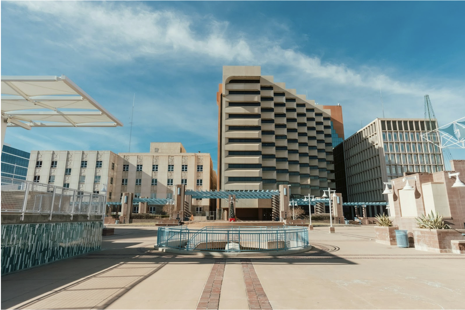 Large commercial building complex representing network infrastructure environments where LAN cable distance impacts performance, reliability, and system design