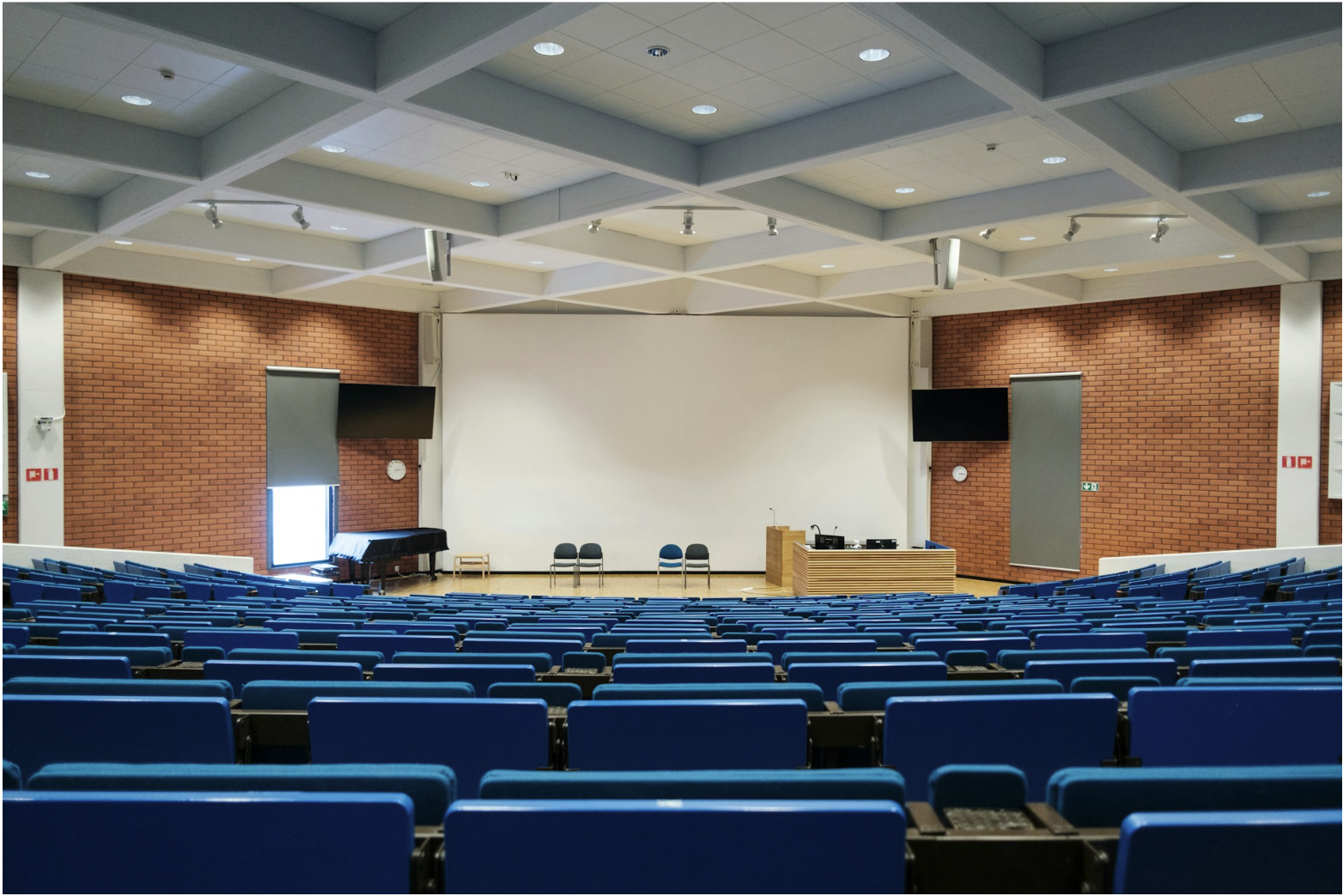 Large lecture hall with integrated AV system, illustrating commercial environments where DB9 serial cables support RS-232 device control and system coordination