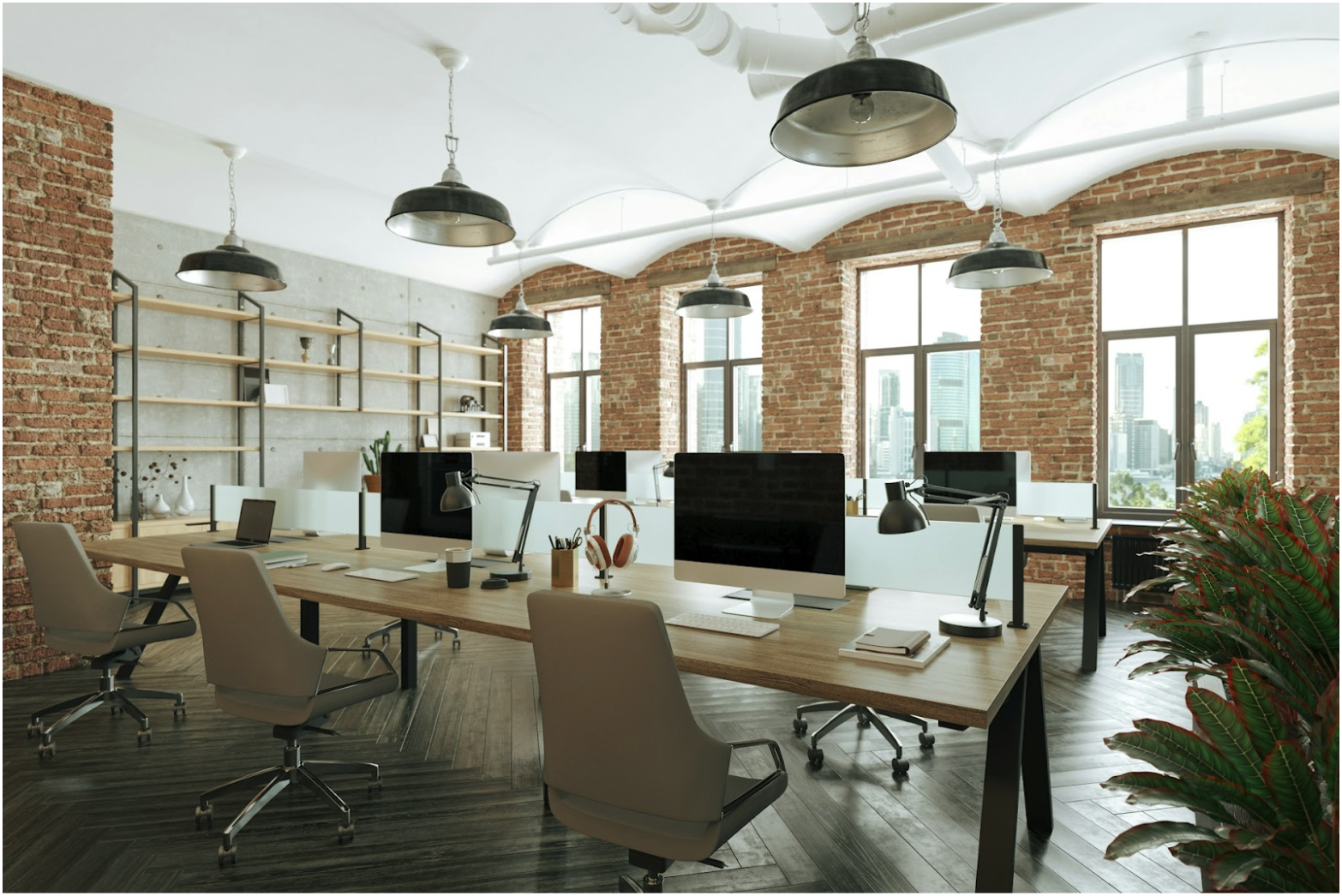 Modern commercial office workspace with computer workstations representing enterprise network infrastructure supported by OM1 and OM3 multimode fiber in commercial network design