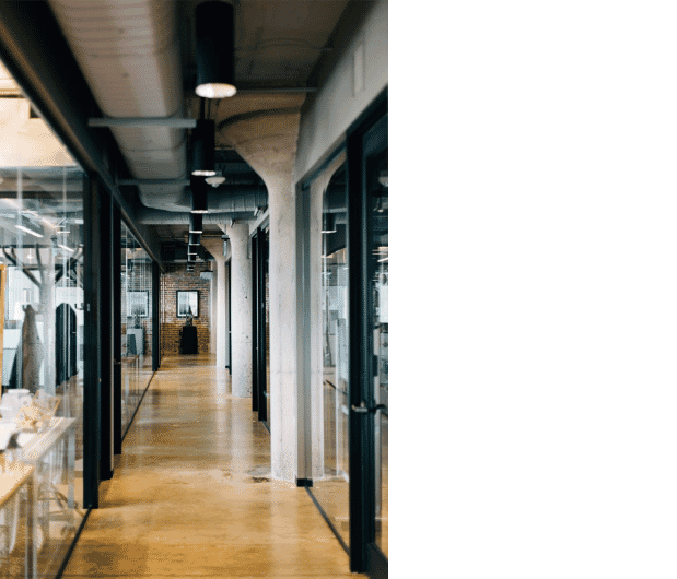 This is a modern office hallway showcasing integrated building automation systems. The image highlights the use of building wire, including high-performance building control cables and building automation wire, for optimized system connectivity. Structured wiring for automation systems ensures efficient data transmission and control signal wiring, enabling seamless communication betweenThis is a modern office hallway showcasing integrated building automation systems. The image highlights the use of building wire, including high-performance building control cables and building automation wire, for optimized system connectivity. Structured wiring for automation systems ensures efficient data transmission and control signal wiring, enabling seamless communication between