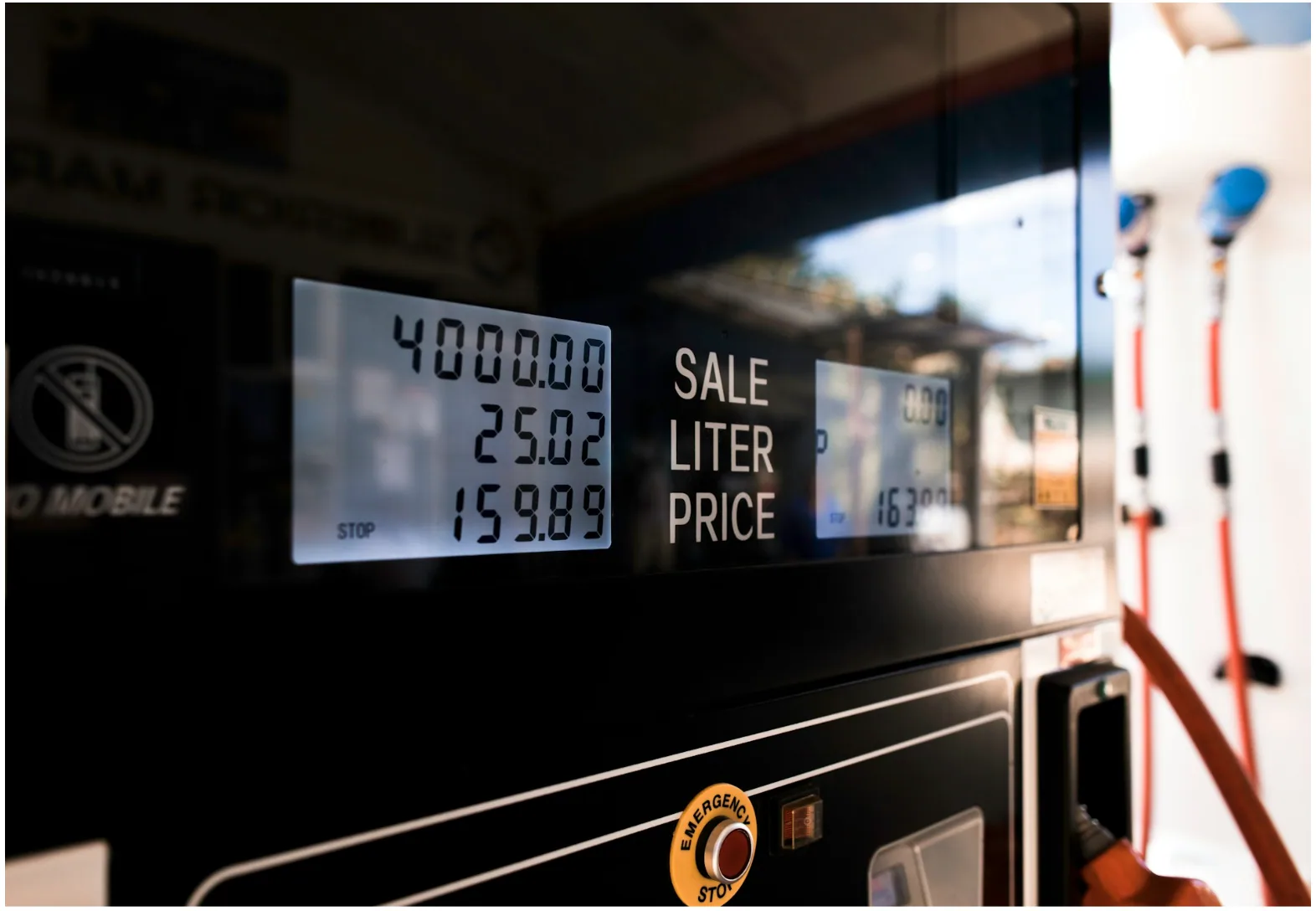 Fuel dispenser display at a commercial gas station, representing petroleum cable environments where shielded FEP cable supports CRIND and fuel system communication circuits