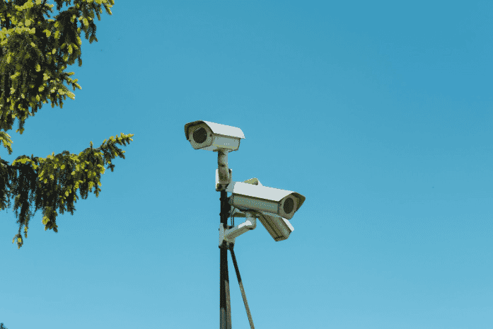 Outdoor security cameras equipped with multi-conductor and composite cabling for robust surveillance, featuring RS485 and RS232 wiring with shielding for security wires and a shielded ground, optimized for harsh weather conditions and indoor-outdoor security system integration