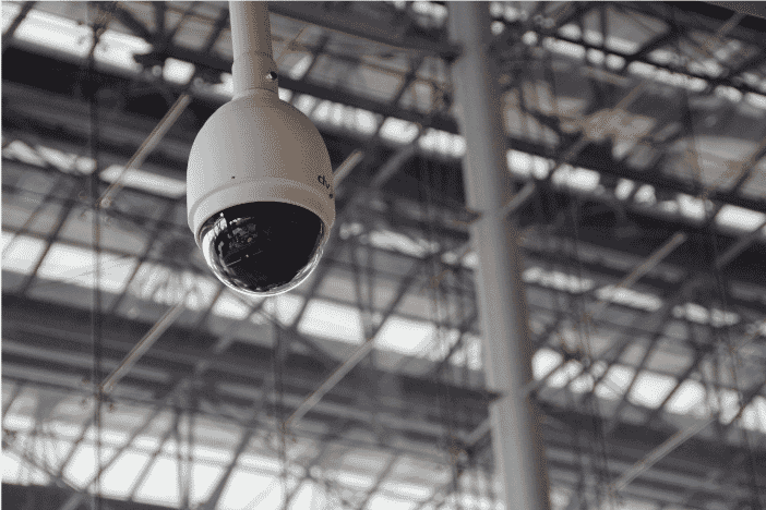 Dome security camera installed indoors, emphasizing the importance of selecting reliable cabling for effective surveillance systems, as detailed in the guide to cables and wires for security setups