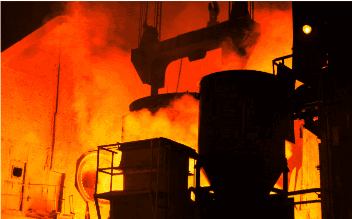 Molten metal pouring in a high-temperature industrial furnace, illustrating the need for durable heat-resistant wiring. Essential in extreme environments, these specialized cables withstand high thermal stress, ensuring safety and operational continuity across industries like manufacturing, energy generation, and heavy equipment operations